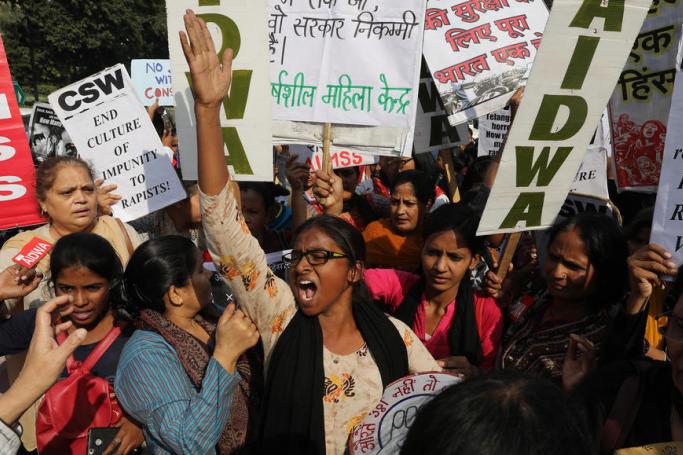 Indian activists hold placards and shout slogans as they protest after a 27-year-old was raped and killed, in New Delhi, India, 02 December 2019. Photo: Raja Gupta/EPA