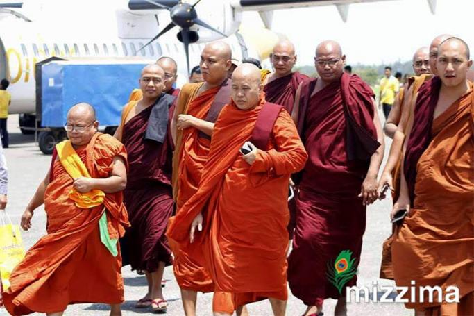 Myanmar monk Wirathu (C) and Ma Ba Tha group arrive  at Sittwe airport to visit Buditaung and Maungdaw in Rakhine State on 3 May, 2017. Photo: RPL/Mizzima
