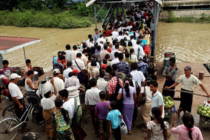 Not enough women in Myanmar have access to reliable family planning - Myanmar people get on and off from the ferry to cross the Yangon river at the Pansodan Jetty in Yangon, Myanmar. Photo: EPA
