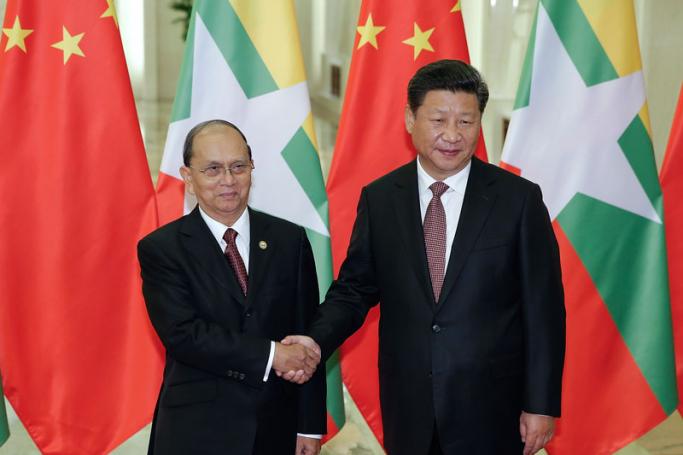 Chinese President Xi Jinping (R) shakes hands with Myanmar's President Thein Sein (L) at The Great Hall Of The People in Beijing, China, 04 September 2015. Photo: Lintao Zhang/EPA
