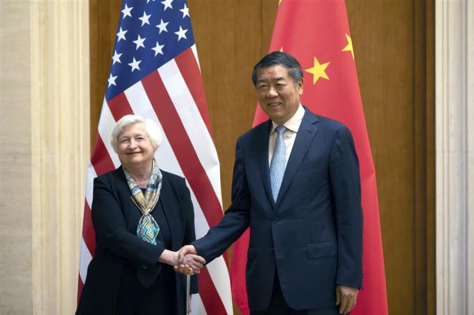 US Treasury Secretary Janet Yellen (L) shakes hands with Chinese Vice Premier He Lifeng during a meeting at the Diaoyutai State Guesthouse in Beijing, China, 08 July 2023. EPA-EFE/MARK SCHIEFELBEIN 