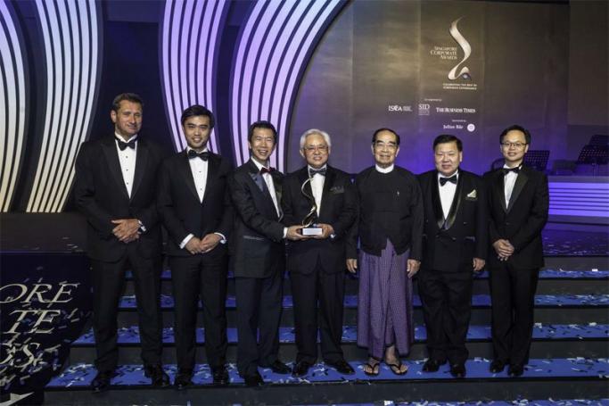 Board of Directors of Yoma Strategic at the Singapore Corporate Awards gala: From left to right: Andrew Rickards, Cyrus Pun, Adrian Chan, Serge Pun, Kyi Aye, Basil Chan and Melvyn Pun. Photo: Yoma Strategic Holdings
