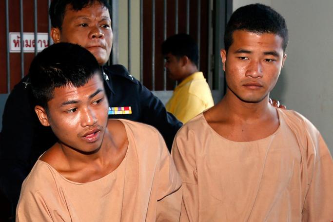 Myanmar migrant workers, who are accused of the killing of two British tourists, Zaw Lin (R) and Wai Phyo (L) are escorted by a Thai police officer after they were sentenced to death at the Samui Provincial Court, on Koh Samui Island, Surat Thani province, southern Thailand, 24 December 2015. Photo: Rungroj Yongrit/EPA
