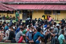 File Photo: Rohingya refugees gather at a makeshift shelter, upon their arrival in the Padang Tiji district of Indonesia’s Aceh province on November 14 2023. / Photo: AFP