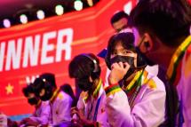 Myanmar Esport team members get ready for their Esport League Of Legends: Wild Rift (Mobile) match during the 31st South-East Asian Games (SEA Games) at the Vietnam National Convention Center in Hanoi. Photo: AFP