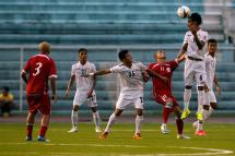 Yan Aung Kyaw (2-R) of Myanmar takes a header during the soccer match against Palestine of the PFF Peace Cup 2014 in Manila, Philippines, 03 September 2014. Photo: Ritchie B. Tongo/EPA
