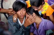 Aung Takon: investigation says 20 people missing. Survivors of the ferry vessel accident cry for their lost relatives as they arrive at the Sittwe port, in Sittwe, western Myanmar on March 14, 2015. Photo: Nyunt Win/EPA
