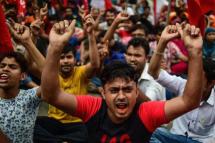 File Photo:  Activists from Bangladeshi garments organization hold a rally in Dhaka on Sept 14, 2018