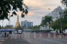 A general view shows an empty street and barricades by Sule pagoda on the second day of Thingyan, the water festival which marks the country's new year, in Yangon on April 14, 2021, as a sweeping crackdown continues by security forces on demonstrations against the military coup. Photo: Ye Thu Aung/AFP