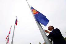 (File) Raising the ASEAN flag with the other 16 nation flags. Photo: EPA
