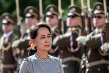 (FILE) - Myanmar's State Counselor Aung San Suu Kyi inspects a guard of honor during a welcome ceremony in Prague, Czech Republic, 03 June 2019 (reissued 10 January 2022). Photo: EPA