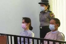File Photo: Aung San Suu Kyi, left, and detained president Win Myint during their first court appearance in Naypyidaw on May 26, 2021 Photo: AFP