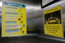 Warning and precaution in helping to avoid spreading the Corona Virus, inside an elevator at a office tower in Yangon, Myanmar, 27 March 2020. Photo: EPA