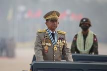 Senior General Min Aung Hlaing (L) participates in a parade during the 76th Armed Forces Day in Naypyitaw, Myanmar, 27 March 2021. Photo: EPA