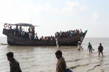 People getting off a boat in Bhashan Char island off the Bangladeshi coast. Photo: Polash Shikder/AFP