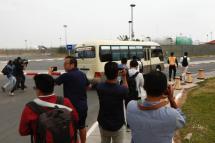 File Photo: A bus carrying Japanese citizens arrives to the Phnom Penh International Airport, in Phnom Penh, Cambodia, 11 April 2023. Cambodian authorities deported 19 Japanese suspects back to their home country on 11 April, over their alleged involvement in phone scams. / Photo:EPA-EFE