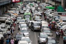A traffic jam at a busy road of downtown area in Yangon. Photo: EPA