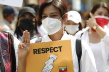 Paing Phyo Thu flashes the three-finger salute in Yangon, Myanmar, 15 February 2021. Photo: Nyein Chan Naing/EPA