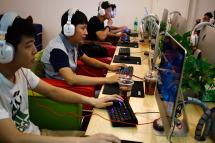 (File) Chinese people use computers in an internet cafe in Beijing, China, 26 June 2015. Photo: EPA
