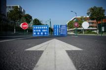 A barrier to stop traffic is seen near the Alibaba headquarters in Hangzhou, southwest of Shanghai -- the operations of many major companies have been affected by the coronavirus outbreak (AFP / NOEL CELIS)