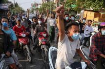 Demonstrators shout slogans while riding on motorcycles during a protest against the military coup in Mandalay, Myanmar, 26 May 2021. Photo: EPA