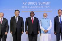 A handout photo made available by Russian Foreign Ministry Press Service shows (L-R) Brazilian President Luiz Inacio Lula da Silva, Chinese President Xi Jinping, South African President Cyril Ramaphosa, Indian Prime Minister Narendra Modi and Russian Foreign Minister Sergey Lavrov posing for a group photograph during the 15th BRICS Summit, in Johannesburg, South Africa, 22 August 2023. Photo: EPA