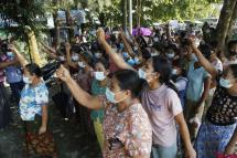 People protest outside the MinGanWard's administration office demanding the Myanmar government to provide low-income families with a higher COVID-19 relief payment, in Sittwe, Rakhine, Myanmar, 20 November 2020. Photo: Nyunt Win/EPA