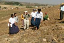 Local and foreign experts are inspecting a crack at the earthen embankment of the Taungnawin Dam in Paukkaung Township. Photo: MNA