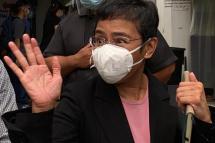 (File) Maria Ressa, Chief Executive Officer (CEO) and Executive Editor of online news site Rappler, gestures as she speaks to the media after attending a hearing outside a regional trial court in Manila, Philippines, 11 March 2021. Photo: EPA