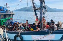 A handout photo made available by the Malaysian Maritime Enforcement Agency on 05 April 2020 shows a wooden boat carrying suspected Rohingya migrants detained in Malaysian territorial waters off the island of Langkawi, state of Kedah. Photo: EPA