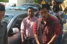 Five people arrested for their involvement in printing a calendar attend a hearing at Pazundaung Township Court on 1 December, 2015. Photo: Myanmar Now
