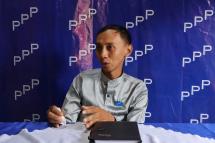 This photo taken on September 12, 2020 shows People's Pioneer Party's (PPP) candidate Myo Min Tun talking to the media in his office in Mandalay, ahead of the November 8 general election. Photo: Ye Naing Ye/AFP