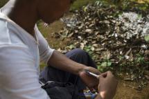 An addict injects himself with heroin. Photo: AFP