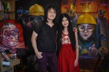 Hong Kong artist duo Lumlong (L) and Lumli pose for a portrait at their studio in London, on June 15, 2023. Photo: AFP