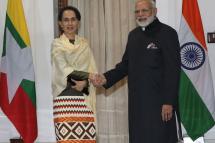 Indian Prime minster Narendra Modi (R) with Myanmar's State counselor Aung San Suu Kyi, prior to a bilateral meeting on the sideline of the ASEAN - India Commemorative Summit in New Delhi, India, 24 January 2018. Photo: Harish Tyagi/EPA-EFE
