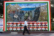 This picture in New Delhi includes portraits of Indian soldiers killed in a hand-to-hand fighting with Chinese soldiers on the borders high in the Himalayas (Photo: AFP)