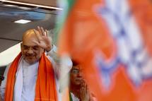 Indian Union Home Minister Amit Shah waves from a specially designed vehicle during a road show campaign for the Bharatiya Janata Party (BJP), ahead of Karnataka Legislative Assembly Polls in Bangalore, India, 02 May 2023. Photo: EPA