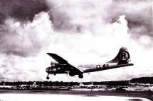 In this photo obtained from the US Air Force, the "Enola Gay," with Col. Paul W. Tibbets piloting, lands on an airstrip on Tinian in the Mariana Islands 06 August 1945, after dropping an atomic bomb on Hiroshima, Japan. Photo: US AIR FORCE/AFP