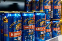 (File) Cans of Kirin Brewery beer are displayed at a liquor shop in Tokyo, Japan, 05 February 2021. Photo: EPA