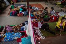 Internally displaced people resting in a church compound in Myitkyina after fleeing conflict between government troops and ethnic armed group in Kachin state. Photo: Ye Aung Thu/AFP
