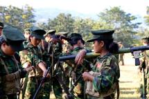 Kachin women attend the military recruit training in Laiza. Photo: Seng Mai/EPA