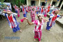 A young Karen group performing with traditional Karen dance in Pananor township during the opening of a village health clinic on 27 June 2015. Photo: Hong Sar/Mizzima
