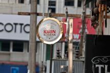 Kirin Brewery beer logo and sign attached at a bar in Yangon, Myanmar, 05 February 2021. Photo: Nyein Chan Naing/EPA