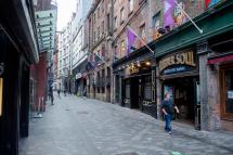 A view on an empty Mathew Street during a local lockdown amidst the spread of the coronavirus disease in Liverpool, Britain, 14 October 2020. Photo: EPA