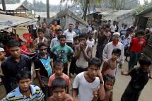 (File) Muslim people gathering near temporary tents at the Thel Chaung Muslim majority village during a census taking near Sittwe, Rakhine State, western Myanmar, 01 April 2014. Photo: Lynn Bo Bo/EPA