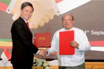 Minister for Trade and Industry Chan Chun Sing and Union Minister for Investment and Foreign Economic Relations Thaung Tun signed the new treaty in Yangon on Sept 24, 2019. Photo: Ministry of Trade and Industry