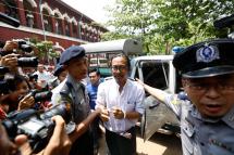 Filmmaker Min Htin Ko Ko Gyi (C) arrives at the Insein township court ahead of his trial in Yangon, Myanmar, 23 May 2019. Photo: Nyein Chan Naing/EPA