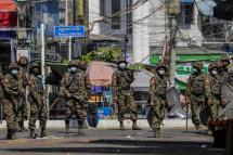 Soldiers patrol on the street during a protest against the military coup in Yangon, Myanmar, 06 March 2021. Photo: EPA