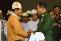 Myanmar's new president Win Myint, seen here with Myanmar Military chief Min Aung Hlaing, right, promised to look at the country's military-written constitution, corruption and human rights in his inaugural speech. Photo: Min Min for Mizzima
