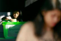 (File) A woman casts her vote at a polling station of Tarmwe township during by-elections in Yangon, Myanmar, 03 November 2018. Photo: Nyein Chan Naing/EPA